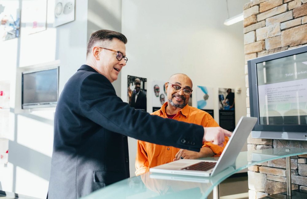 Man Pointing Laptop Computer